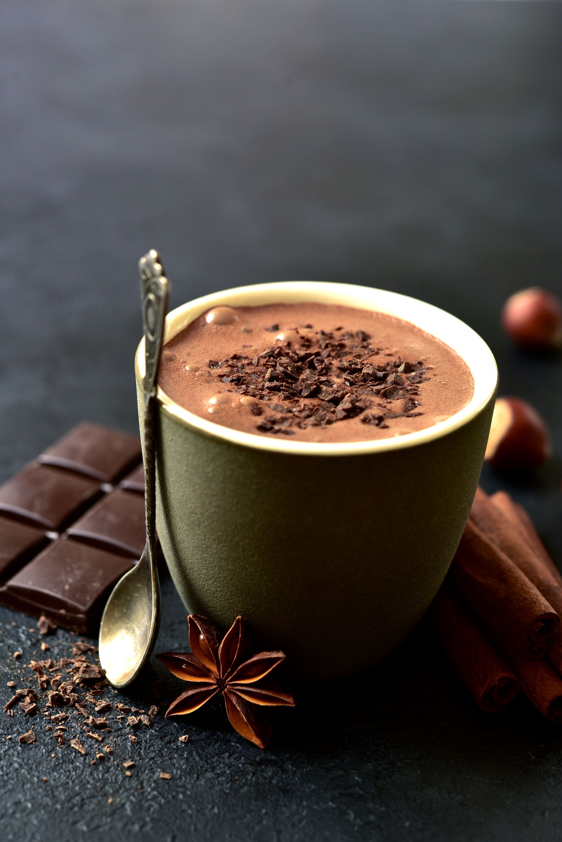 Spicy hot chocolate with ingredients for making.