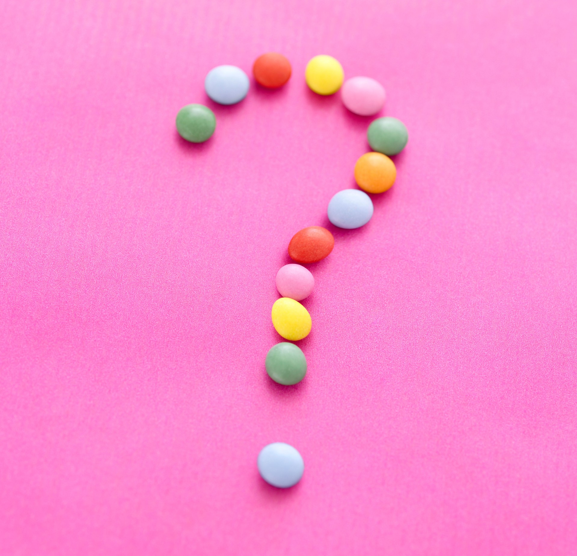 Diet concept - Question mark of multicolored candy